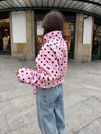 Women's pink cropped polka dot trench coat with high collar and waist tie