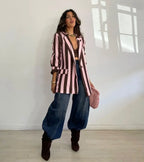 Women's striped blazer with notched lapels, button fastening and flap pockets