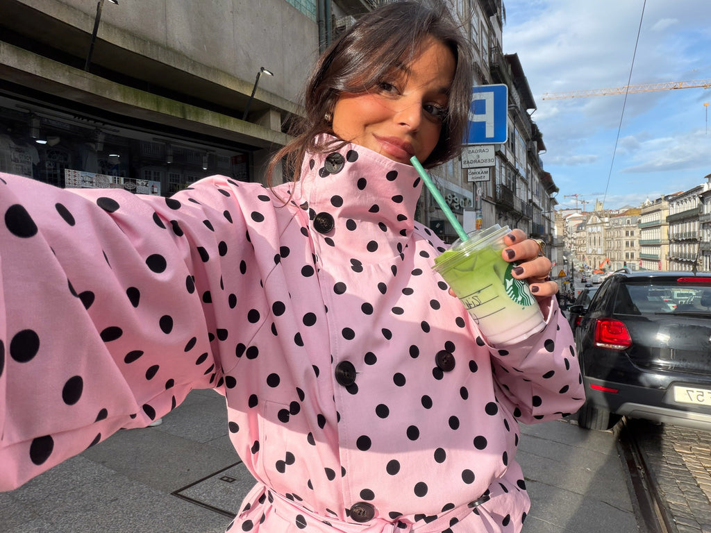 Women's pink cropped polka dot trench coat with high collar and waist tie