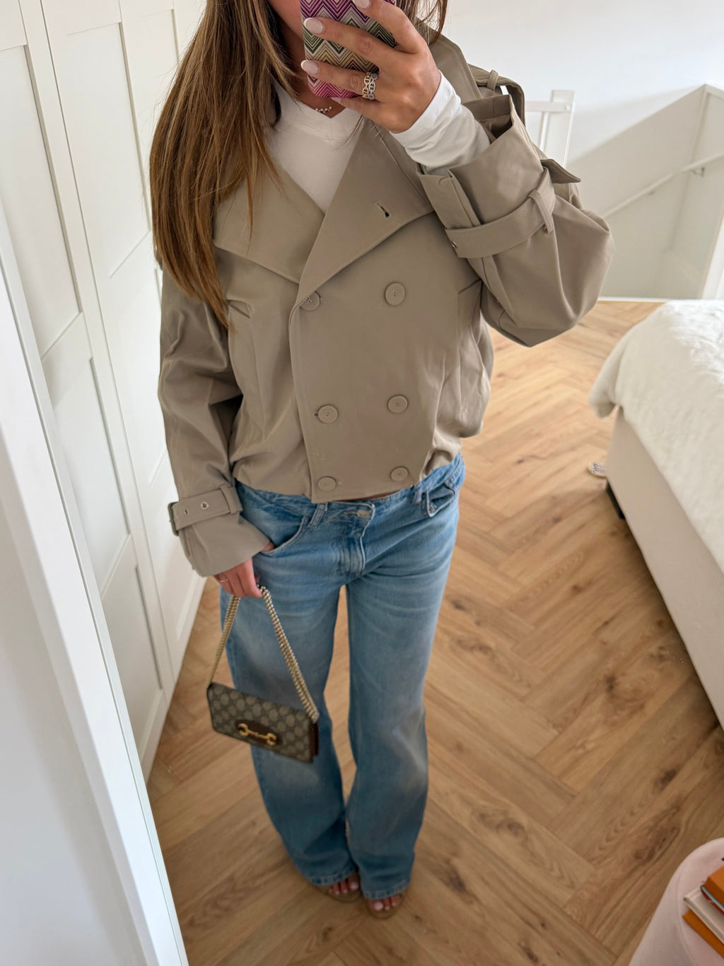 Women's beige cropped double-breasted trench jacket with high collar and belted cuffs