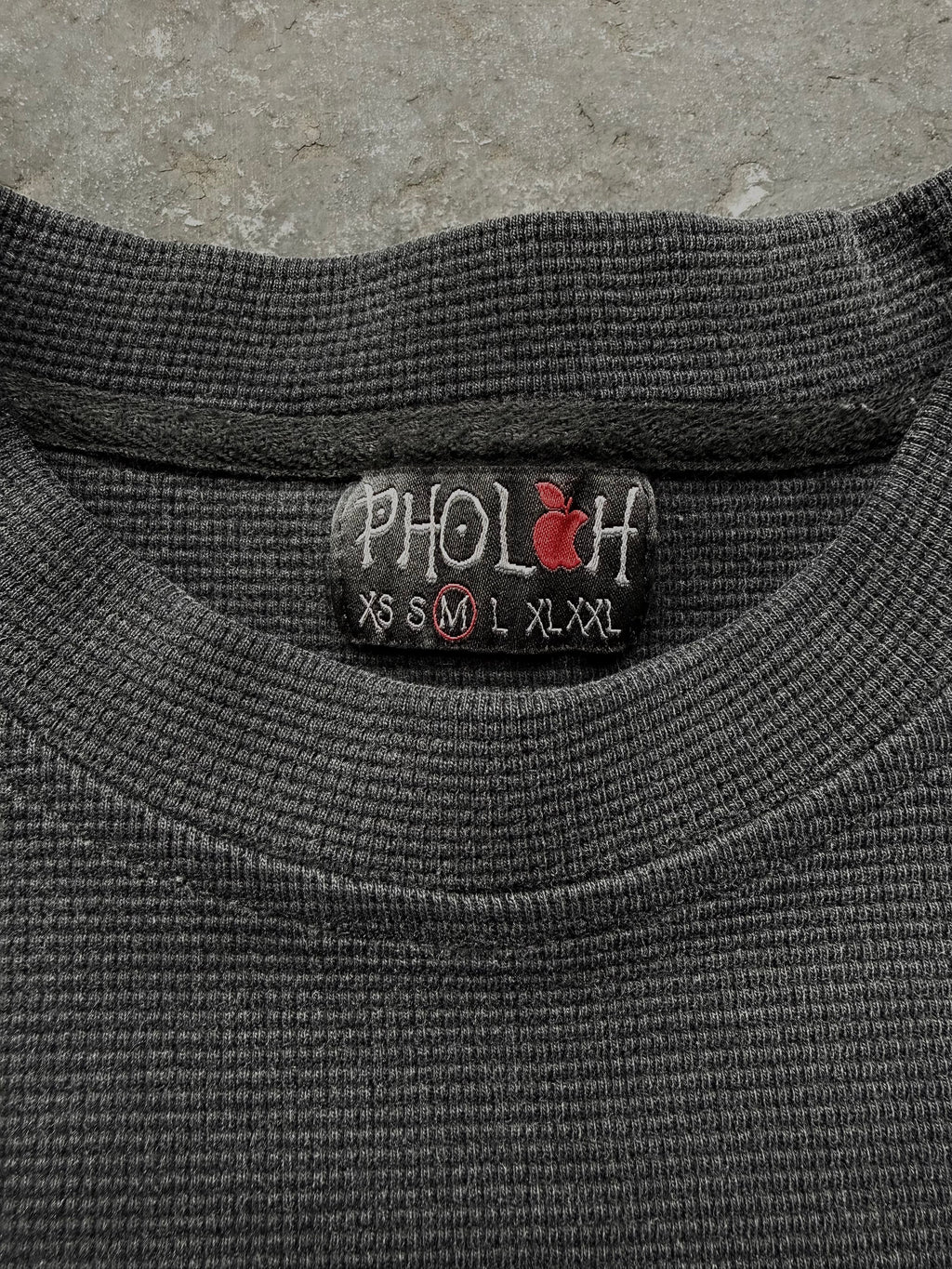 Dark graphic sweatshirt with contrasting front figure design