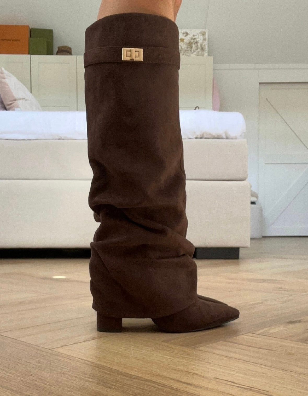Women's brown slouch knee-high boots with pointed toes