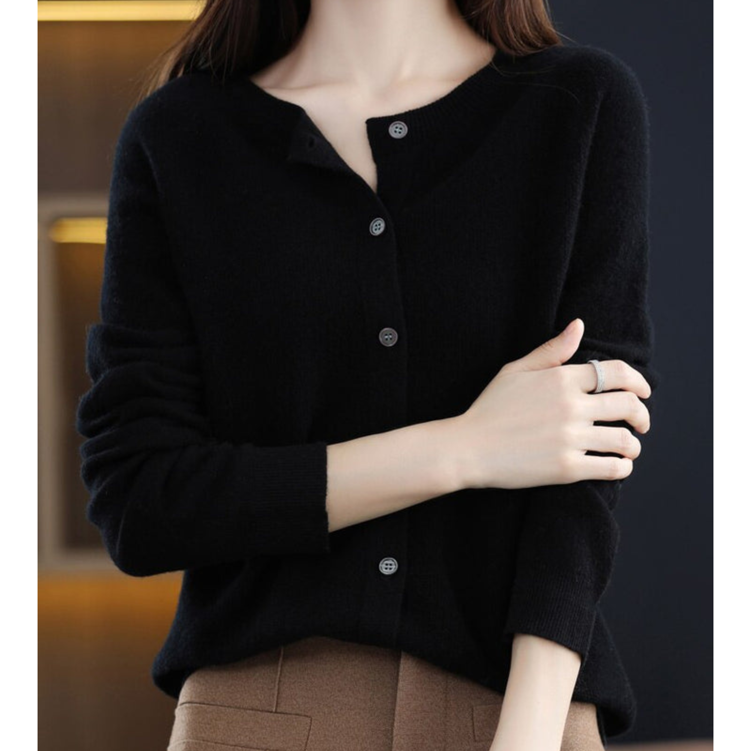 Women's knitted button front cardigan with crew neckline