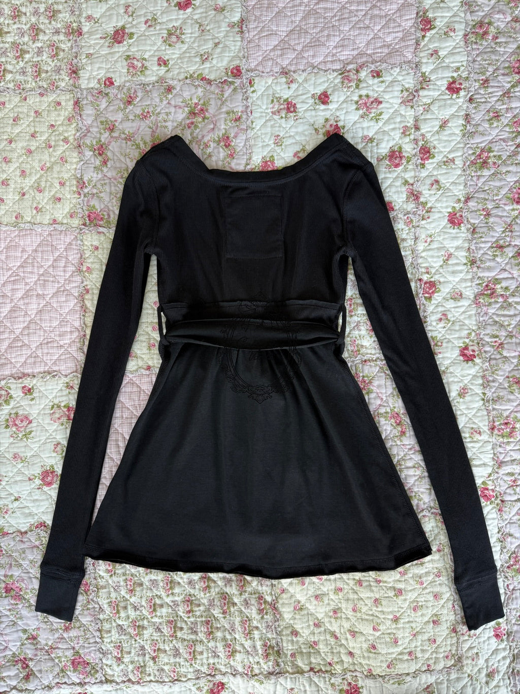 Women's wrap babydoll top with V-neck and tie waist