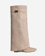 Women's beige knee-high boots with pointed toes and buckle straps