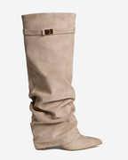 Women's beige slouchy knee-high boots with buckle strap