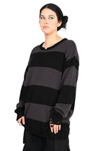 Unisex black and grey striped knit sweater with distressed hem