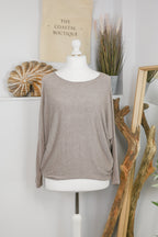 Women's long-sleeved round neck knitted jumper on a mannequin