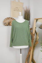 Women's long-sleeved round neck knitted jumper on a mannequin