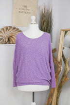 Women's long-sleeved round neck knitted jumper on a mannequin