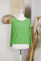 Women's long-sleeved round neck knitted jumper on a mannequin