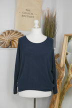 Women's long-sleeved round neck knitted jumper on a mannequin
