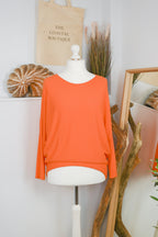 Women's long-sleeved round neck knitted jumper on a mannequin