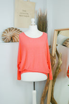 Women's long-sleeved round neck knitted jumper on a mannequin