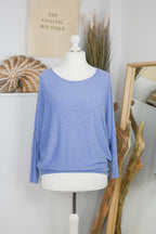 Women's long-sleeved round neck knitted jumper on a mannequin