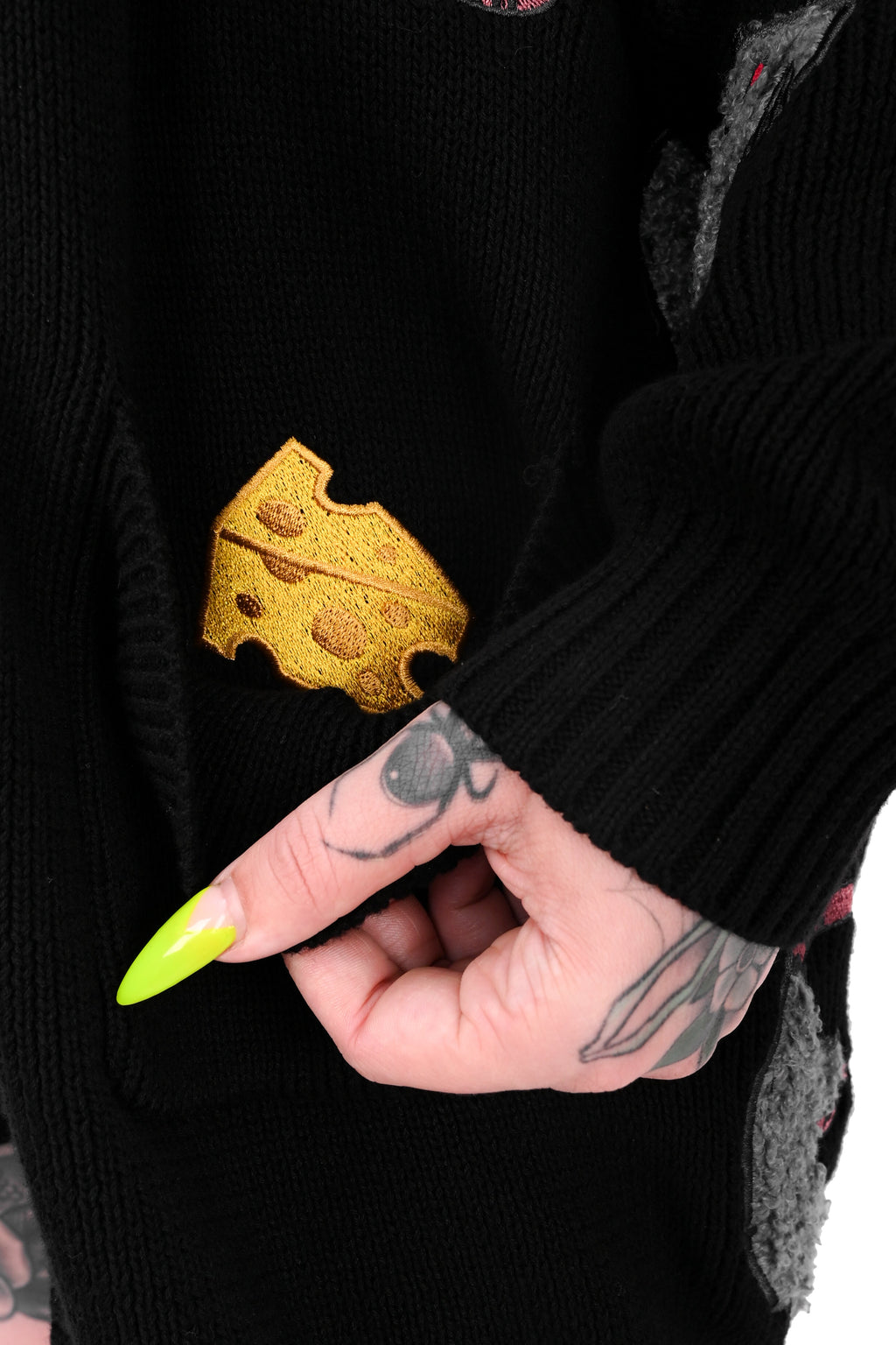 Black cardigan with repeated rat motifs and button front