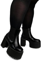 Women's black platform Chelsea boots with elastic side panels