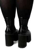 Women's black platform Chelsea boots with elastic side panels