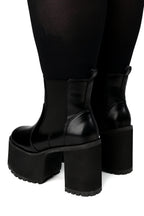 Women's black platform Chelsea boots with elastic side panels