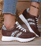 Women's low-top platform sneakers with lace-up front and contrast panel details