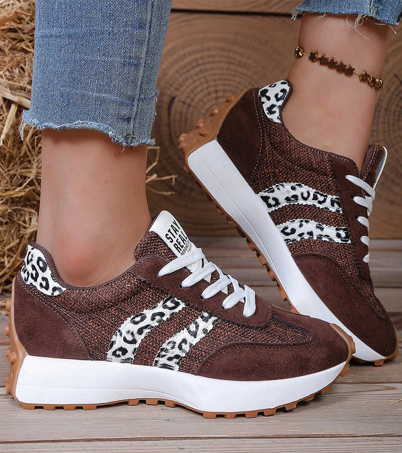 Women's low-top platform sneakers with lace-up front and contrast panel details