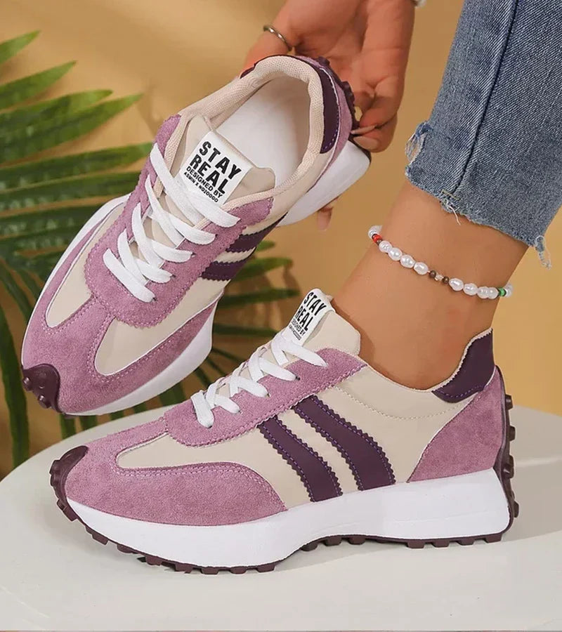 Women's low-top platform sneakers with lace-up front and contrast panel details