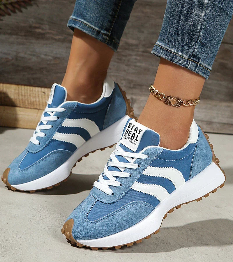 Women's low-top platform sneakers with lace-up front and contrast panel details