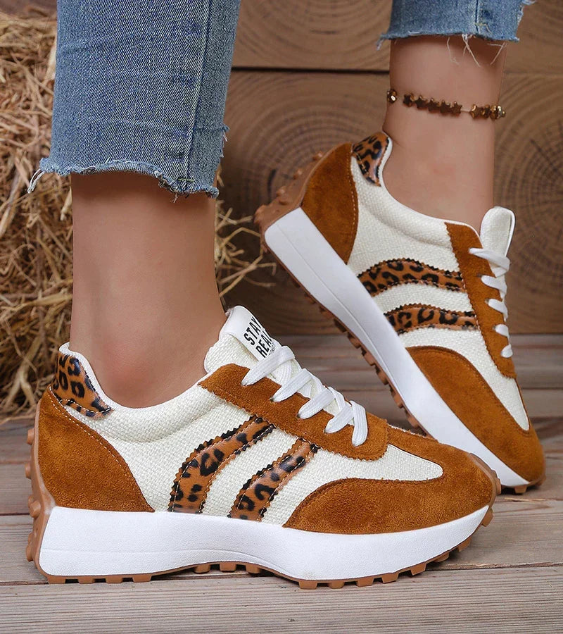 Women's low-top platform sneakers with lace-up front and contrast panel details