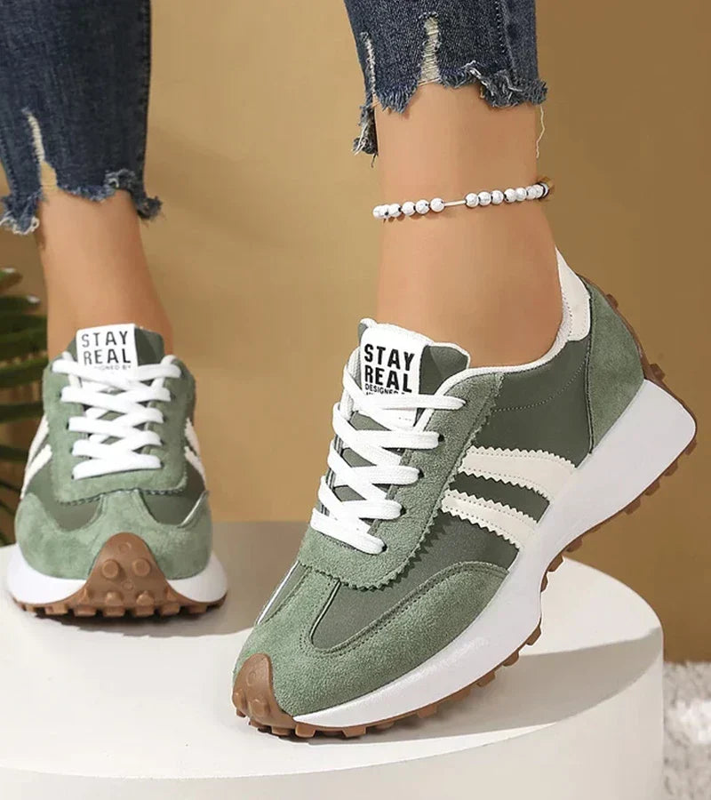 Women's low-top platform sneakers with lace-up front and contrast panel details
