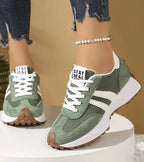 Women's low-top platform sneakers with lace-up front and contrast panel details