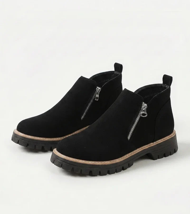 Women's ankle boots with side zips, rounded toes and chunky lug soles
