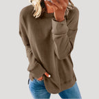 Women's oversized plain long-sleeve sweater with crew neckline and curved hem