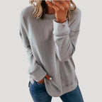 Women's oversized plain long-sleeve sweater with crew neckline and curved hem