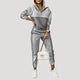 Women's hooded tracksuit set with patterned panels and joggers