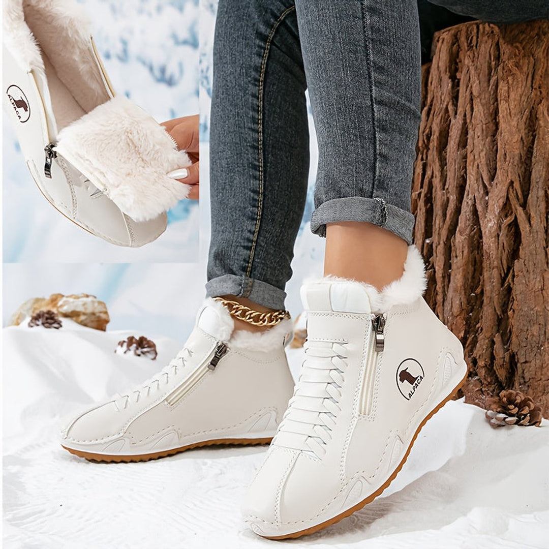 Women's fur-lined lace-up ankle boots with side zip and ridged sole