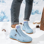 Women's fur-lined lace-up ankle boots with side zip and ridged sole