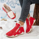 Women's fur-lined lace-up ankle boots with side zip and ridged sole