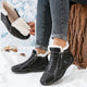 Women's fur-lined lace-up ankle boots with side zip and ridged sole