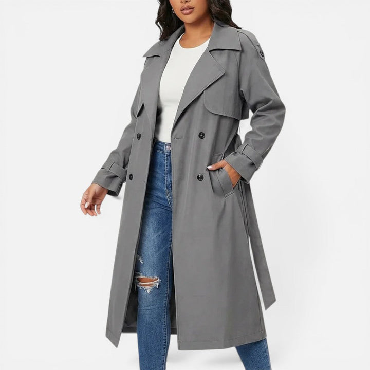 Women's longline double-breasted trench coat with notched lapels and cuff tabs