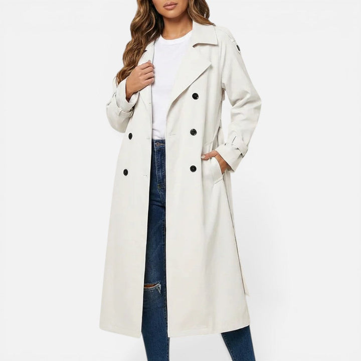 Women's longline double-breasted trench coat with notched lapels and cuff tabs