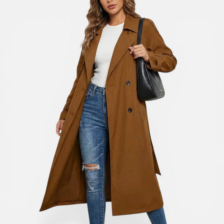 Women's longline double-breasted trench coat with notched lapels and cuff tabs