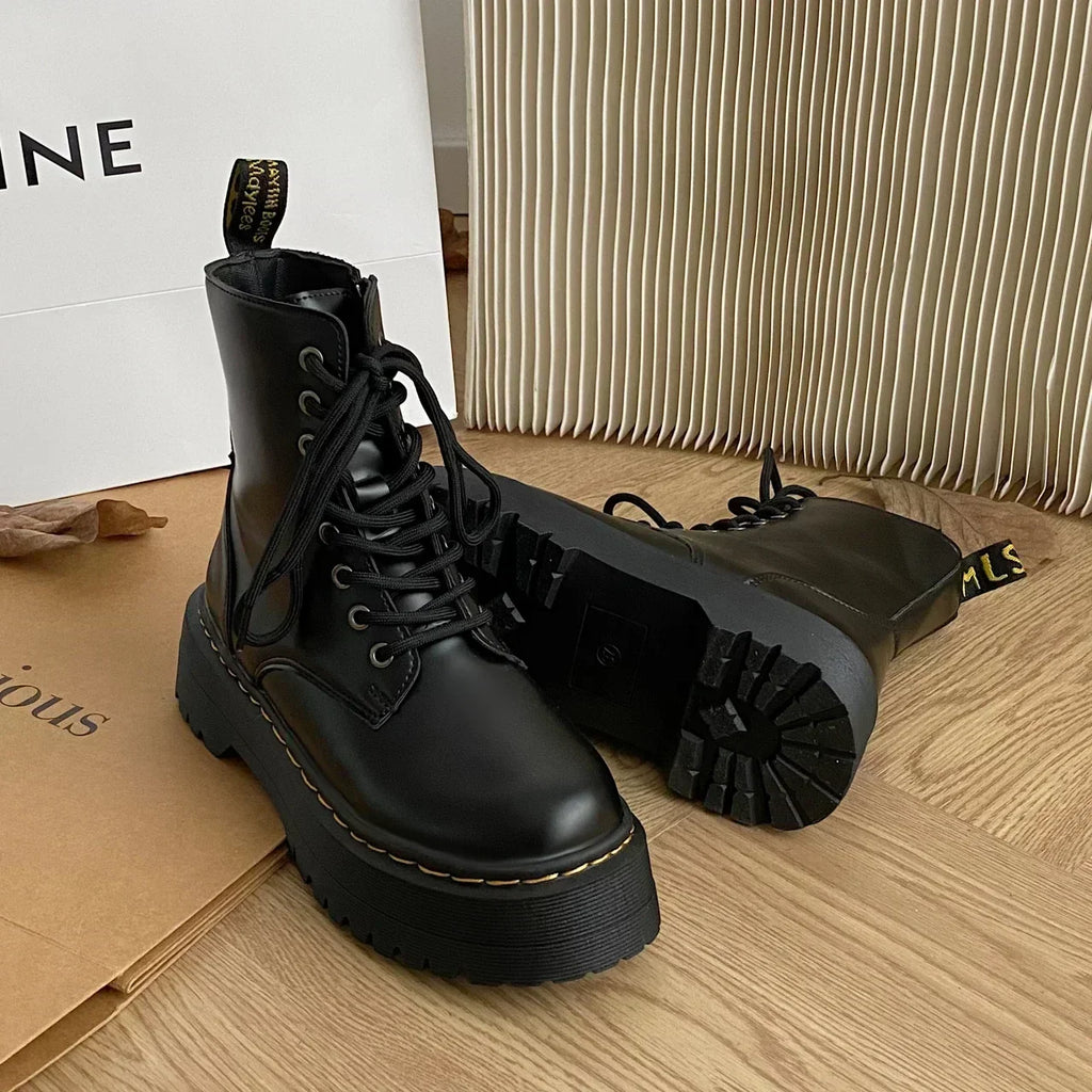 Black women's lace-up combat boots with chunky platform soles