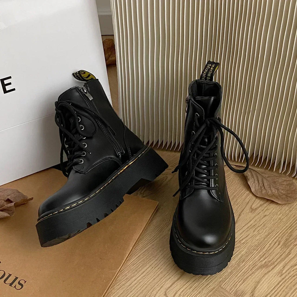 Black women's lace-up combat boots with chunky platform soles