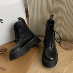Black women's lace-up combat boots with chunky platform soles