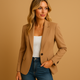 Women's fitted blazer with notched lapels and buttoned flap pockets