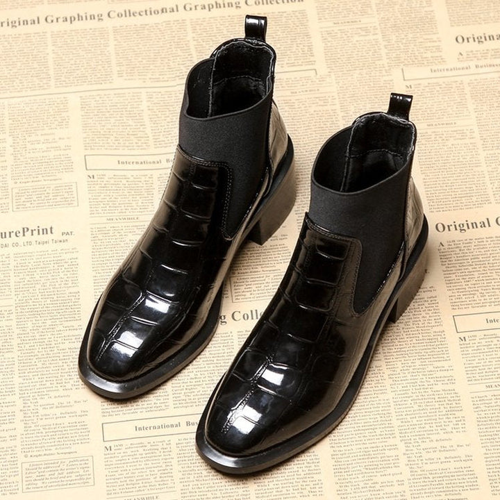 Women's black Chelsea ankle boots with glossy crocodile-effect panels and block heels
