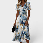 Women's blue floral wrap midi dress with V-neck and short sleeves