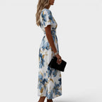 Women's blue floral wrap midi dress with V-neck and short sleeves
