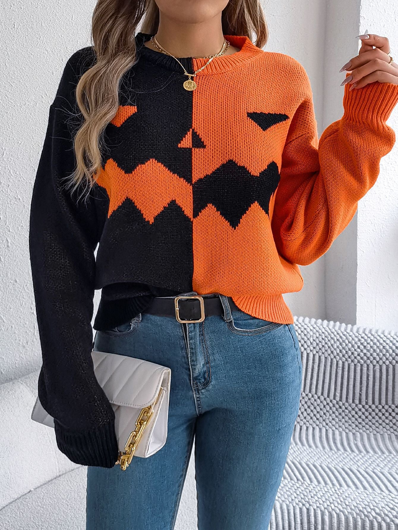 Women's graphic knit sweater with crew neckline and ribbed trims