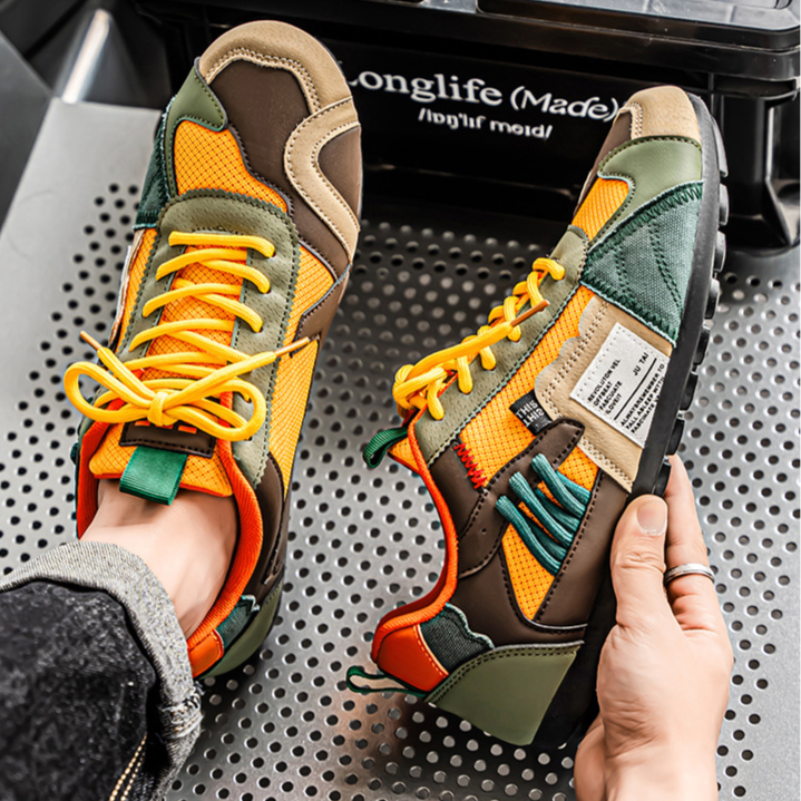 Colourblock utility trainers with layered panels and lace-up fronts